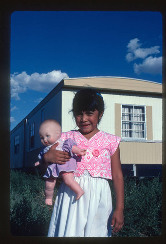 Girl with doll