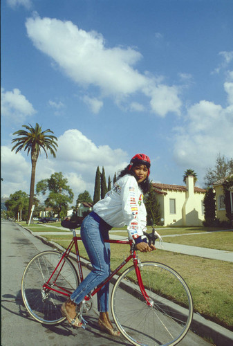 Model riding bianchi bicycle