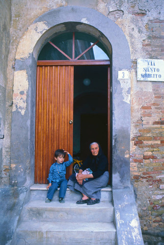 Child and grandmother on steps