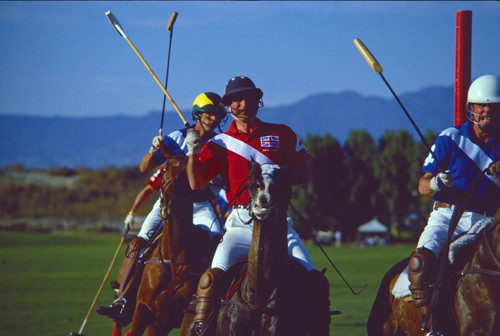 Prince Charles playing polo