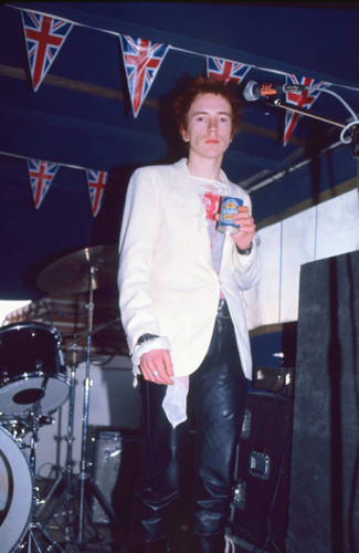 Johnny Rotten holding can