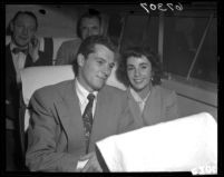Elizabeth Taylor and husband Conrad Hilton Jr. on bus Long Beach, Calif., 1950