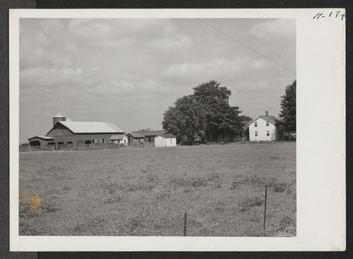Typical farmland house and barns in southern Illinois. Photographer: Mace, Charles E., Illinois