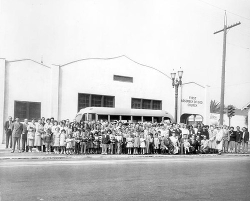 Group photograph outside the First Assembly of God Church