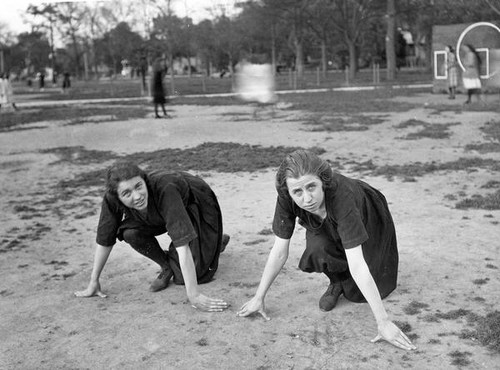 Two runners in starting position