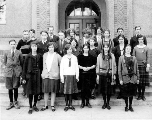 Male and female students posing for photograph