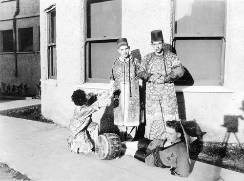 Four actors in Chinese dress