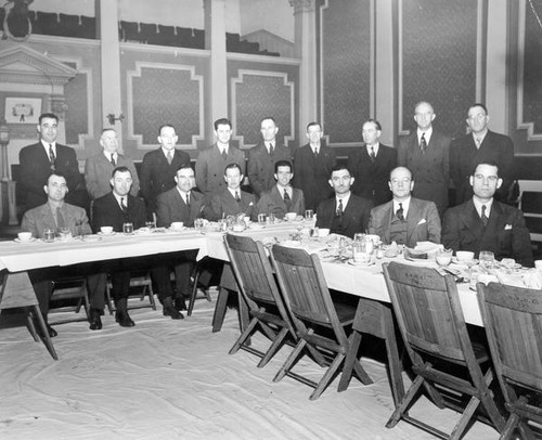 Men around a table