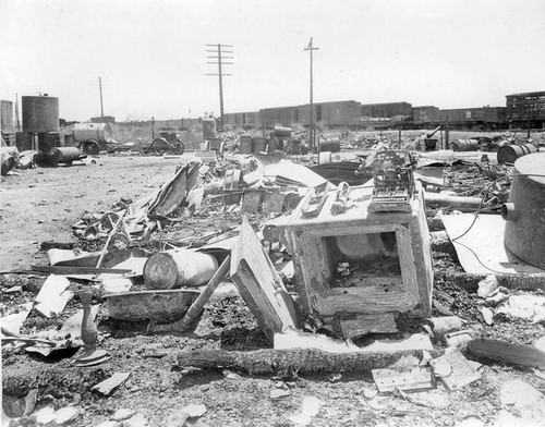 Debris and safe near railroad tracks