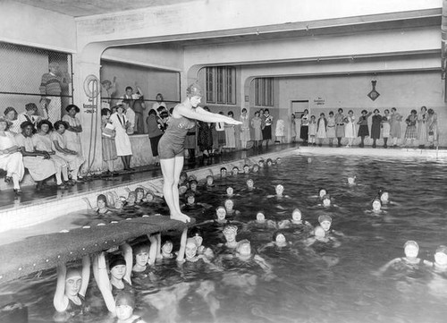 Female student preparing to dive