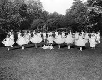 Young ballerinas performing outdoors