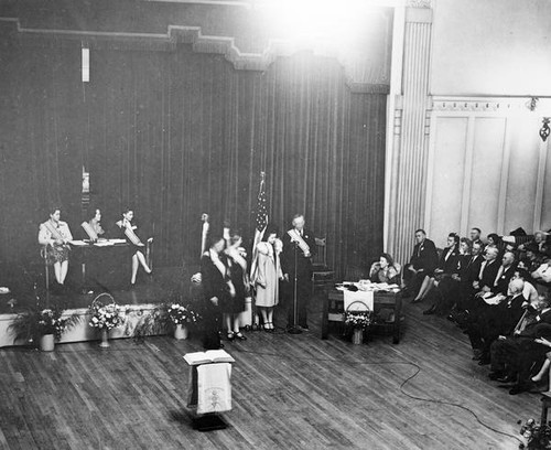 People gathered in an assembly hall at Grange convention