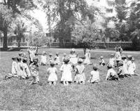 Children playing on the grass at San Jose State