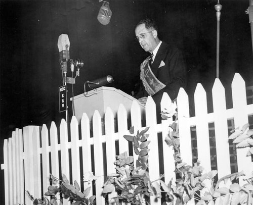 Man speaking at podium