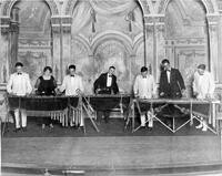 Musicians playing on Marimbas