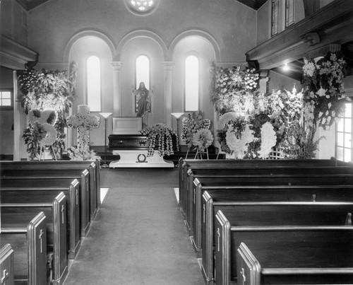 Casket in an empty church