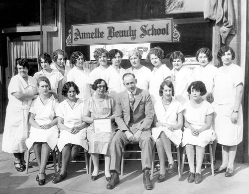 Group portrait of Annette Beauty School staff and students