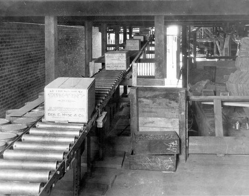 Crates of canned apricots