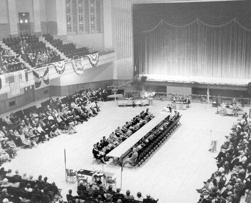 People gathered in an assembly hall at Grange convention