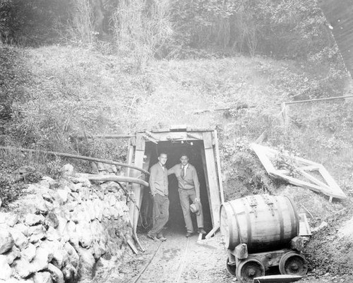 Two men at the Senador Mine entrance