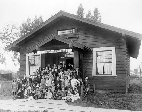 Children outside of St. Edward's Hall