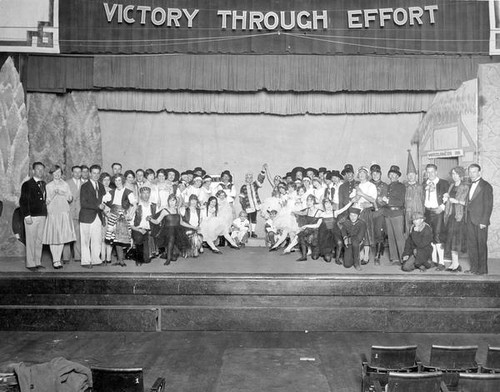 Students posing onstage