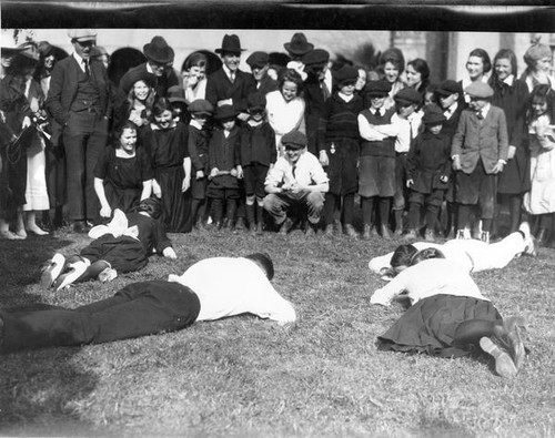 Four people on the grass