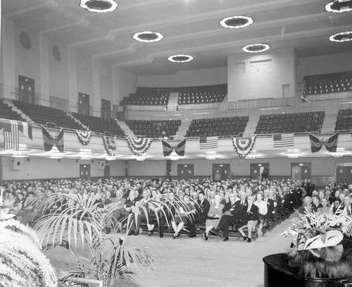 People gathered in an assembly hall at Grange convention