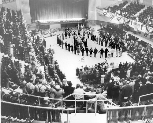 People gathered in an assembly hall at Grange convention