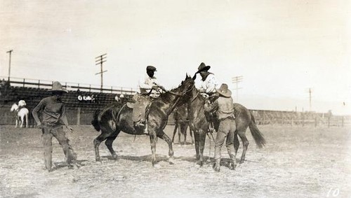 Men on horseback