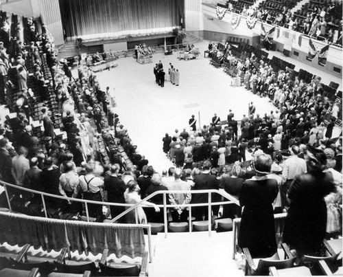 People gathered in an assembly hall at Grange convention