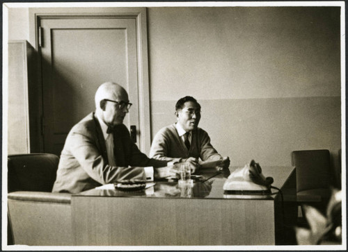 Charles Protzman sitting at a desk