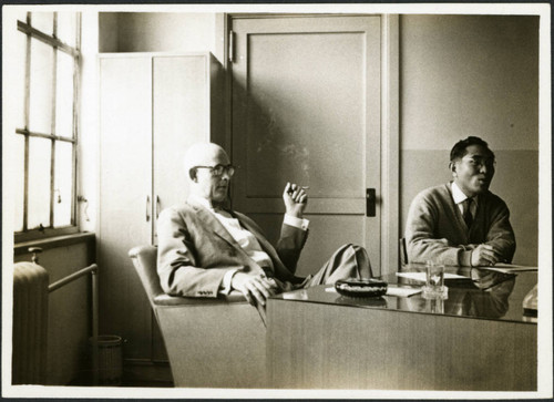 Charles Protzman sitting at a desk