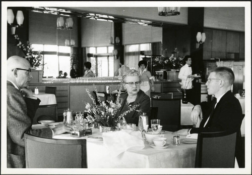 Charles Protzman and his wife dining