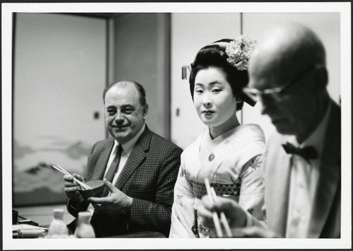 Charles Protzman sitting for a meal