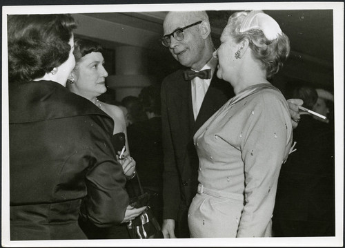 Charles Protzman and his wife socializing