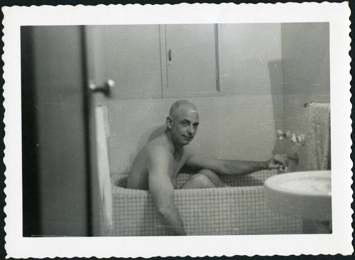 Charles Protzman in a bathtub