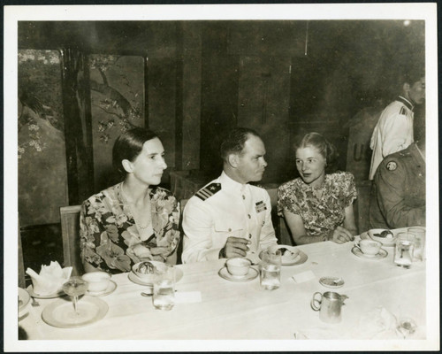 Priscilla Polkinghorn with Commander Haskell at a banquet