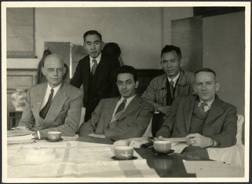 Charles Protzman and Homer Sarasohn with three men