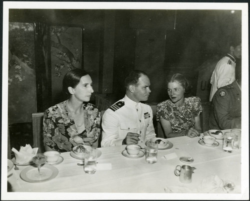 Priscilla Polkinghorn with Commander Haskell at a banquet