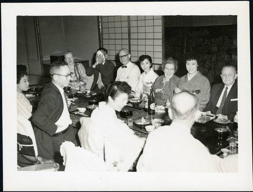 Charles Protzman and his wife socializing