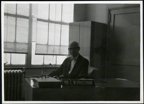 Charles Protzman at his desk