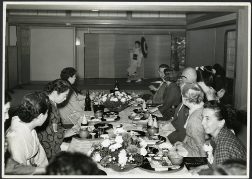 Charles Protzman and his wife watching a performance