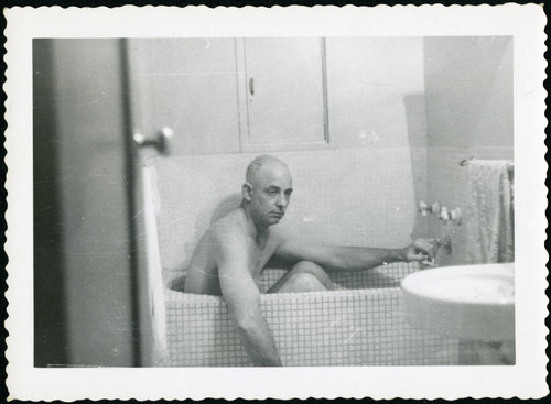 Charles Protzman in a bathtub