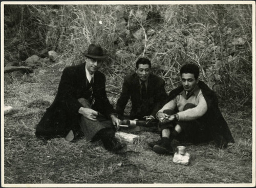 Charles Protzman and Homer Sarasohn sitting with a man