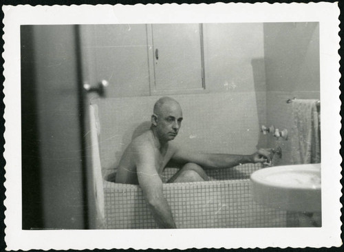 Charles Protzman in a bathtub