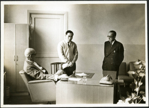 Charles Protzman sitting at a desk