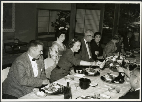 Charles Protzman sitting for a meal