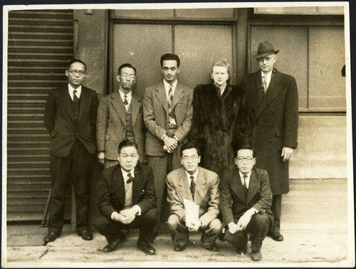 Charles Protzman and Homer Sarasohn with a group of people