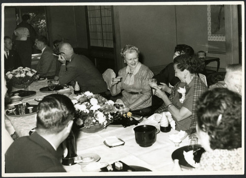Charles Protzman and his wife sitting at a table